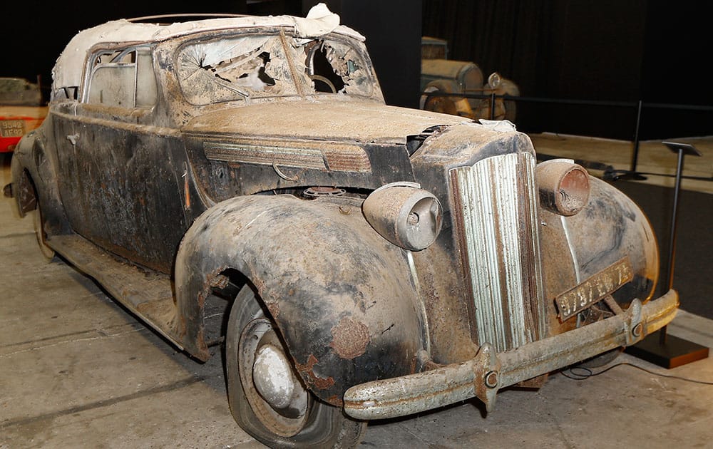 A Packard Eight Cabriolet displayed during a preview for an auction of vintage cars Retromobile show in Paris, after a treasure trove of classic cars was discovered after spending 50-years languishing in storage on a farm. 60 rusting motors, which include a vintage Ferrari California Spider, a Bugatti and a very rare Maserati, were found gathering dust and hidden under piles of newspapers in garages and outbuildings at a property in France