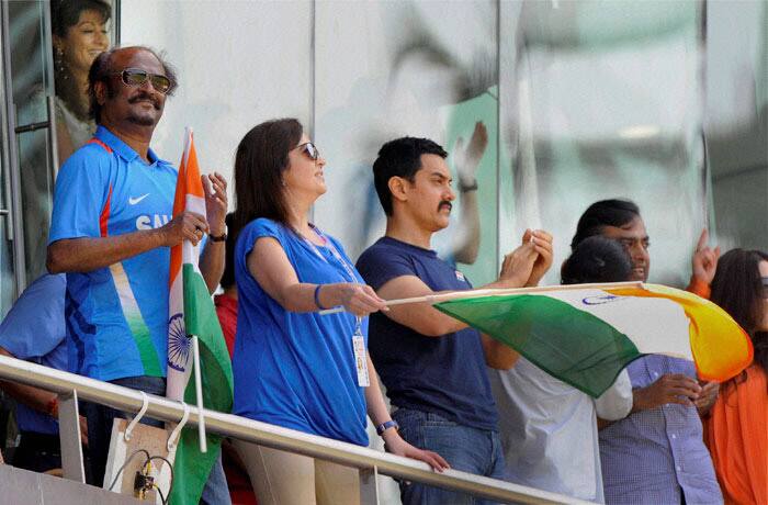 Union Minister Kapil Sibal, Shiv Sena Executive President Uddhav Thackeray, actors Rajinikanth and Aamir Khan watching the final match.