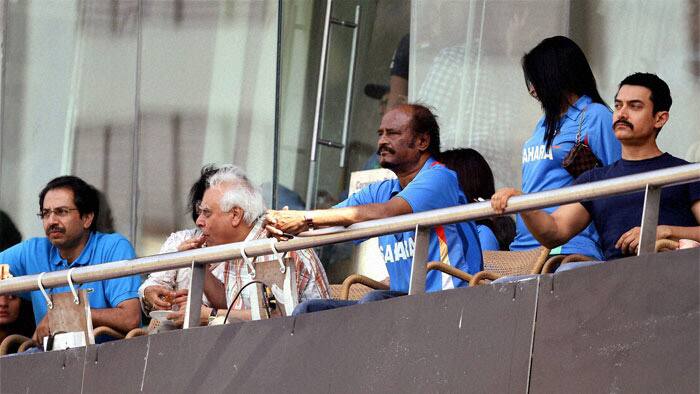 Mukesh and Nita Ambani cheer for India, along with Rajinikanth and Aamir Khan. 