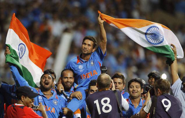 Sachin Tendulkar is carried by fellow team members after India won the World Cup final against Sri Lanka in Mumbai. 