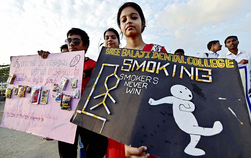 College students participate in an awareness campaign to mark the World Cancer Day at Marina beach in Chennai.