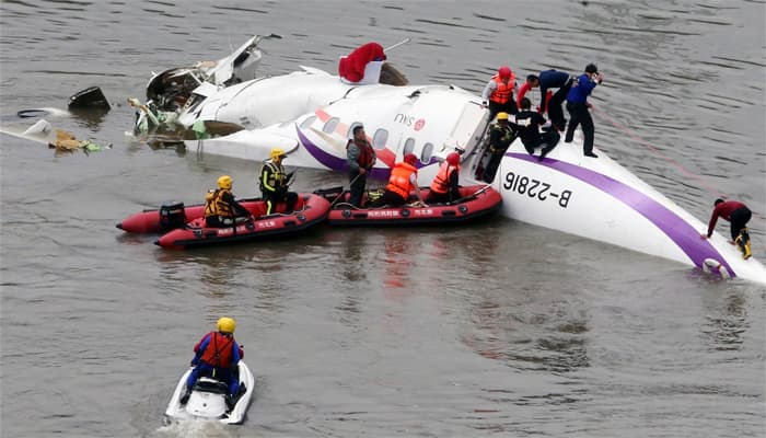 Crashed Taiwan plane hoisted from river; 26 confirmed dead