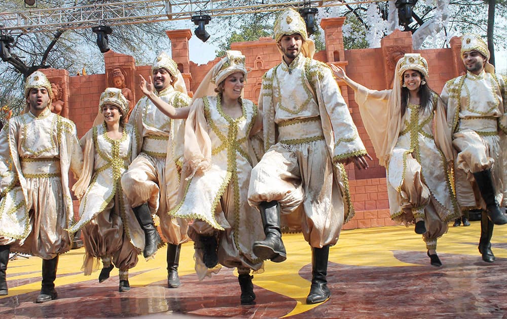 Lebanese artists perform during a press preview for the 29th International Crafts Mela in Surajkund.