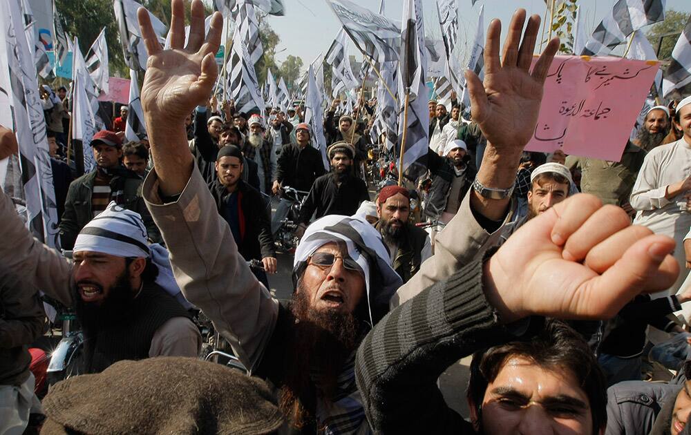 Supporters of Pakistani religious party Jamaat-ud-Dawa rally, in Peshawar, Pakistan.