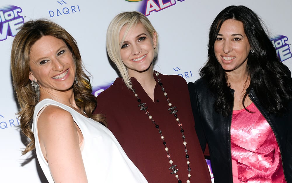 Ashlee Simpson Ross, poses with 'The Moms' co-creators Denise Albert and Melissa Musen Gerstein, at the Crayola Color Alive Action Color Pages launch event at Open House, in New York.