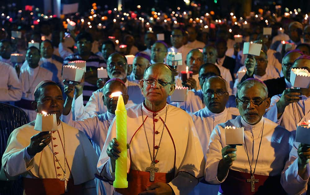 Catholic Bishops from different Indian states participate in a candle light vigil to protest against recent attacks on churches in the Indian capital, as they assemble outside St. Antony's Church after attending the 27th Plenary Assembly of the Conference of Catholic Bishops of India in Bangalore.