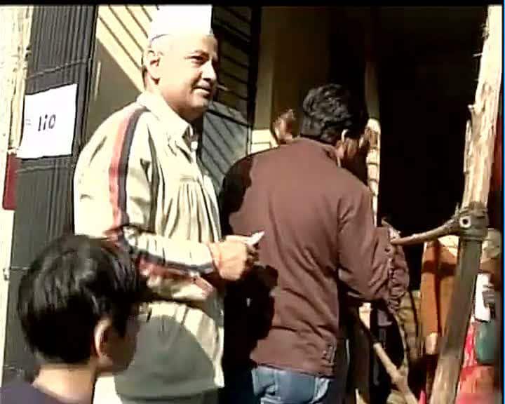 AAP's Manish Sisodia wating outside Padav Nagar polling booth to cast his vote #DelhiVotes -twitter