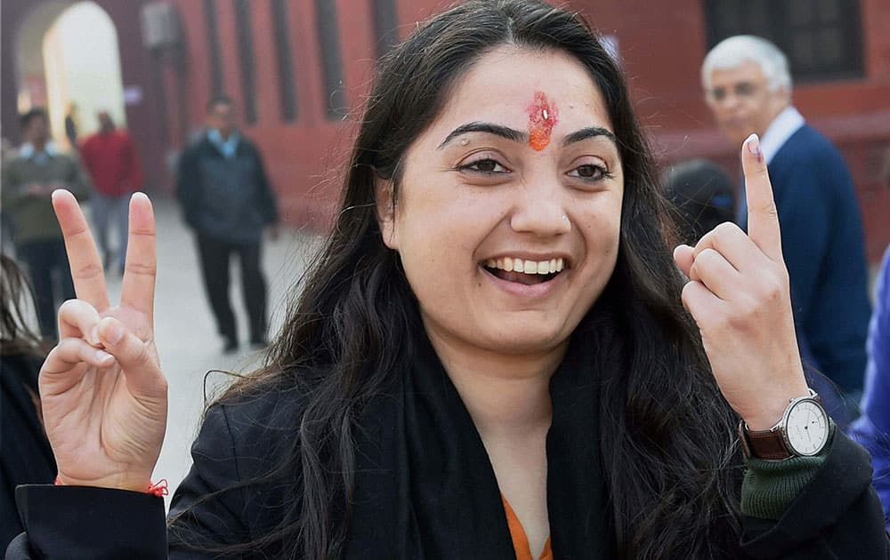 BJP candidate Nupur Sharma after casting her vote for the Assembly elections, in New Delhi.