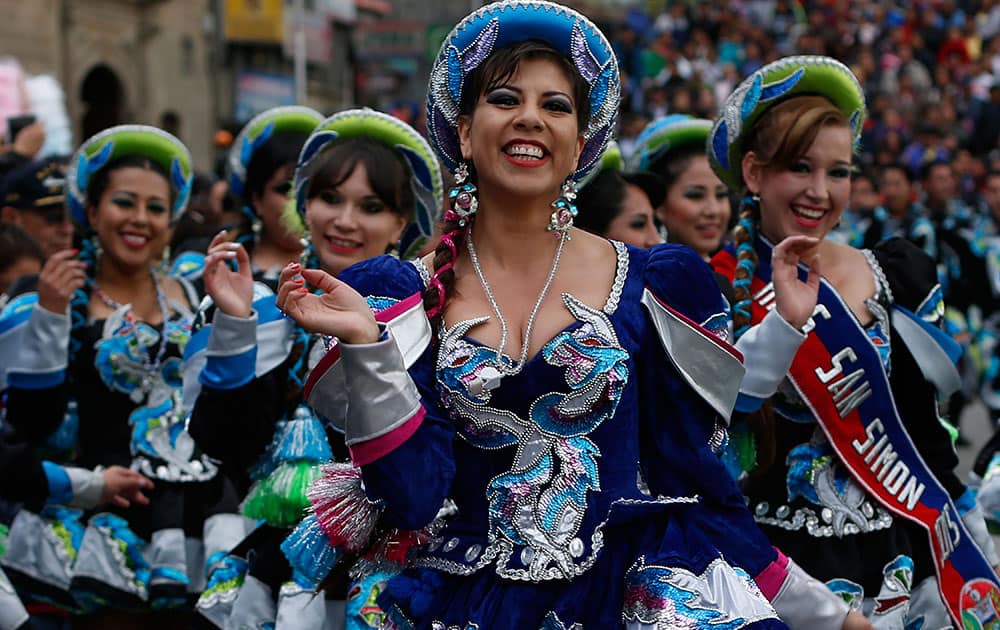 Women dance Caporal during the carnival in La Paz, Bolivia.