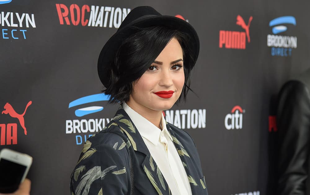 Demi Lovato arrives at the Roc Nation Pre-Grammy Brunch at RocNation Offices in Beverly Hills, Calif.