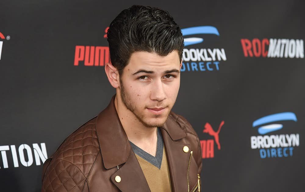 Nick Jonas arrives at the Roc Nation Pre-Grammy Brunch at RocNation Offices in Beverly Hills, Calif. 