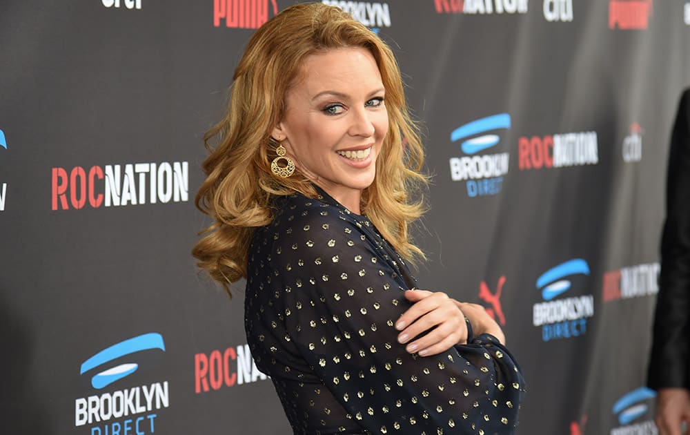 Kylie Minogue arrives at the Roc Nation Pre-Grammy Brunch at RocNation Offices in Beverly Hills, Calif.