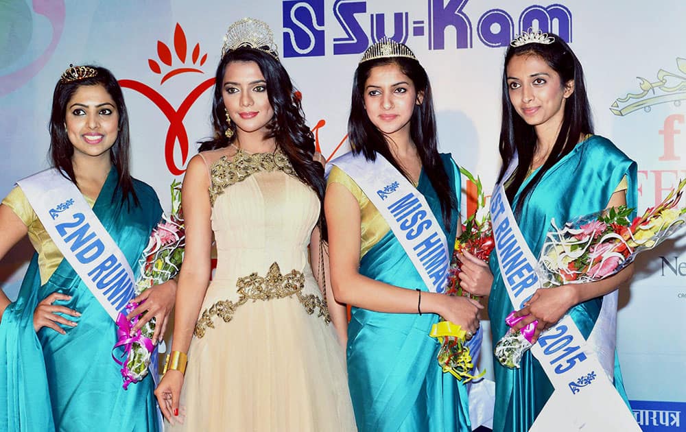 Participants of the Miss Himachal beauty pageant 2015 along with Miss Universal Peace & Humanity 2014 Ruhi Singh (2nd from L) in Dharamsala.