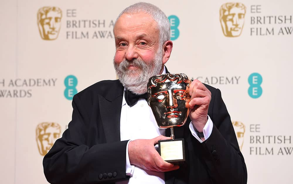 Director Mike Leigh, winner of the BAFTA Fellowship, poses for photographers in the winners room, at the British Academy Film and Television Awards 2015, during the British Academy Film and Television Awards 2015.