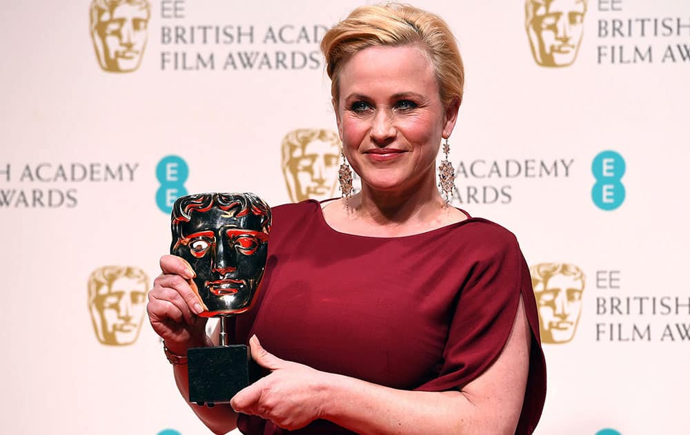 Patricia Arquette, winner of the Best Supporting Actress award for Boyhood poses for photographers in the winners room, during the British Academy Film and Television Awards 2015.