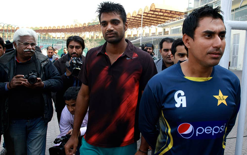 Pakistan cricketers Rahat Ali and Nasir Jamshed, arrive for press conference in Lahore, Pakistan. Ali and Jamshed leave for Australia later on Monday to replace Pakistan's injured World Cup players Junaid Khan and Mohammad Hafeez.