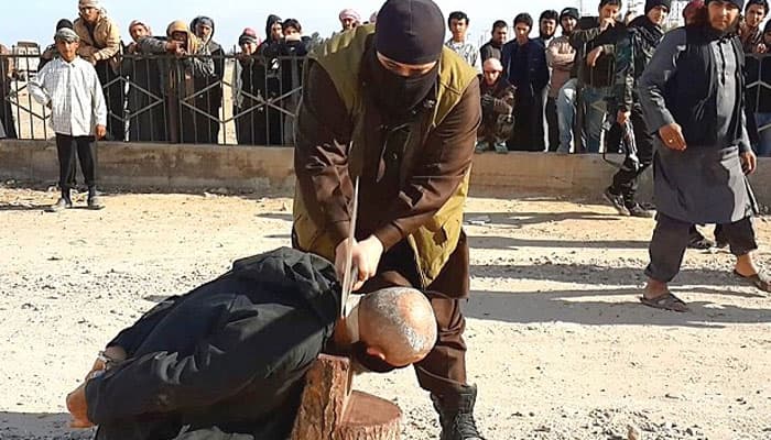 Islamic State militants publicly behead man for witchcraft in Syria