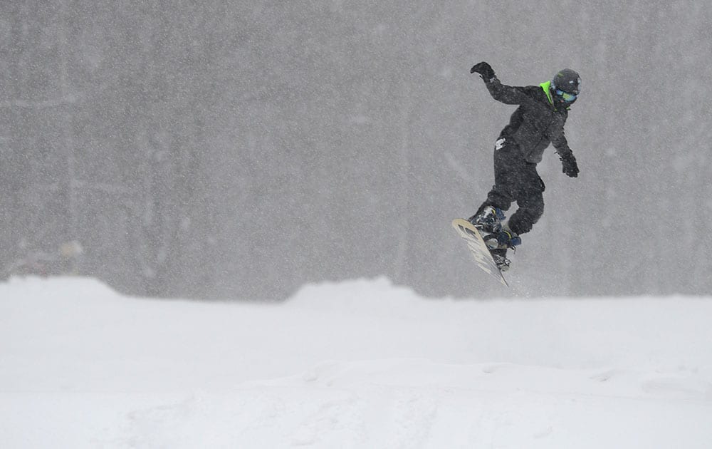 A person uses a snowboard at Val Bialas Sports Center, in Utica, N.Y.