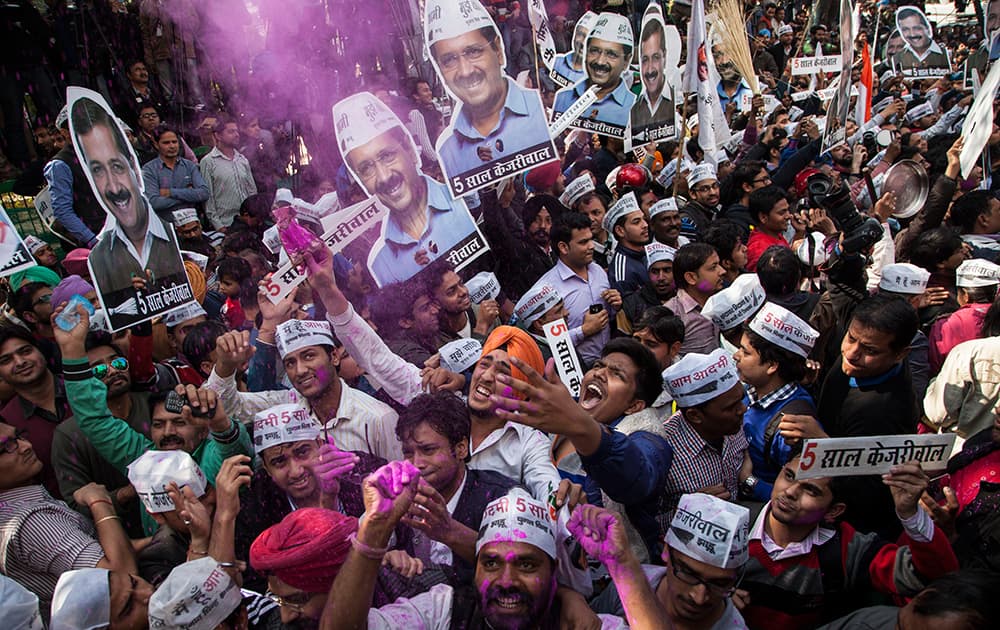 Supporters of the Aam Aadmi Party celebrate their party's victory in New Delhi.