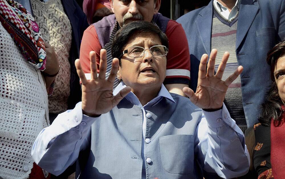 BJP leader Kiran Bedi addresses a press conference at her residence in New Delhi.