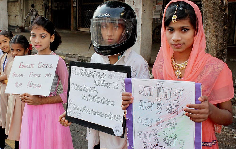 Girl students participate in an awareness rally against declining sex ratio in Nagpur, Maharashtra.