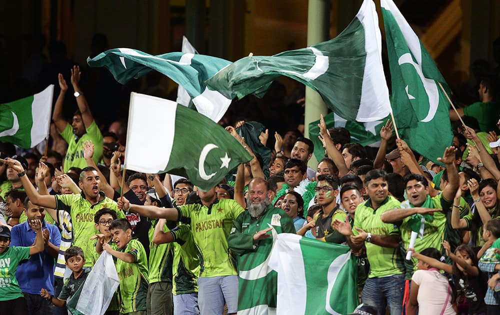 Pakistan fans celebrate after their ten defeated England in their Cricket World Cup warm-up match in Sydney, Australia.
