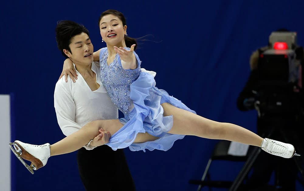 Maia Shibutani and Alex Shibutani of the United States perform the free dance to winning bronze medals in the ice dance during the ISU Four Continents Figure Skating Championships in Seoul.