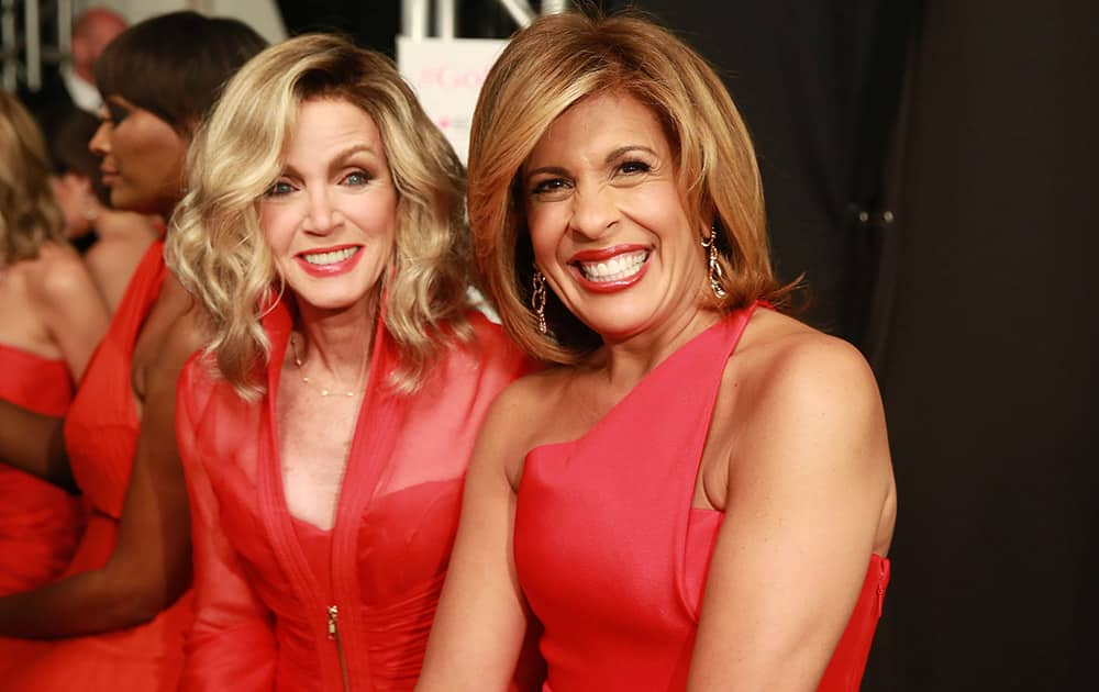 Donna Mills and Hoda Kotb poses backstage at the Go Red For Women Red Dress Collection 2015 presented by Macy's during Mercedes-Benz Fashion Week Fall 2015 at Lincoln Center.