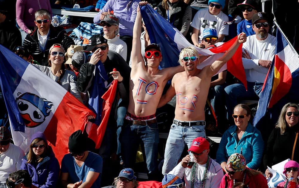 Fan cheer during the men's giant slalom competition at the alpine skiing world championships, in Beaver Creek, Colo. 