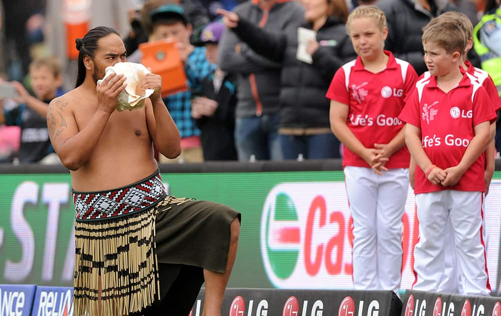 A New Zealand Maori man blows on a shell at the start of the opening match of the Cricket World Cup match between New Zealand and Sri Lanka at Christchurch, New Zealand.