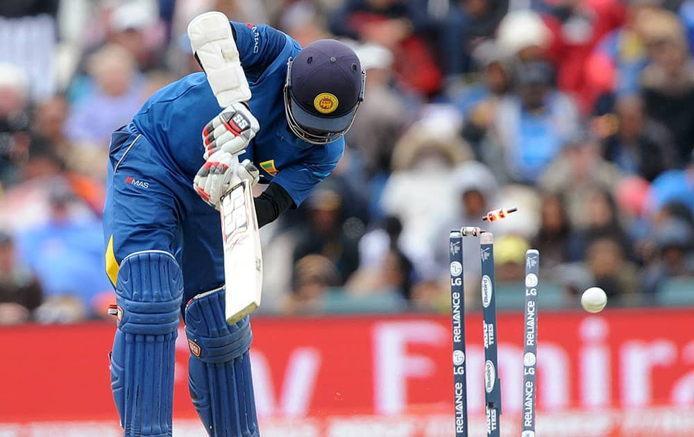 Sri Lanka's Lahiru Thirimanne is bowled out for 65 runs against New Zealand during the opening match of the Cricket World Cup at Christchurch, New Zealand.