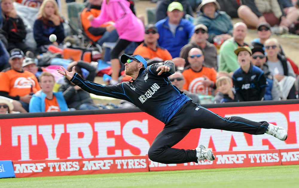 New Zealand's Corey Anderson dives in an attempt to catch out Sri Lanka's Jeevan Mendis during the opening match of the Cricket World Cup at Christchurch, New Zealand.