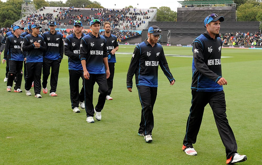 New Zealand's players leave the field after defeating Sri Lanka by 98 runs in the opening match of the Cricket World Cup at Christchurch, New Zealand.