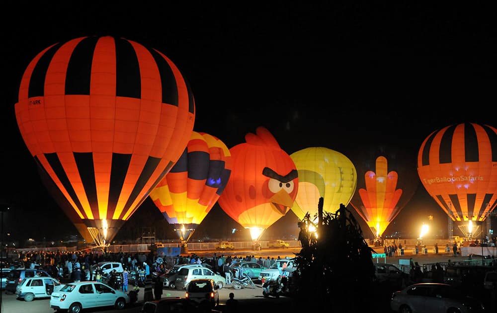 People enjoying International Hot Air Balloon Show at Lal Parade Ground in Bhopal on Friday evening.