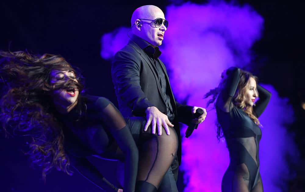 Pitbull performs on stage at the Pitbull and Enrique Iglesias concert at Staples Center.