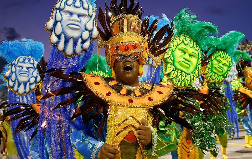 A dancer from the Nene de Vila Matilde samba school performs during a carnival parade in Sao Paulo.