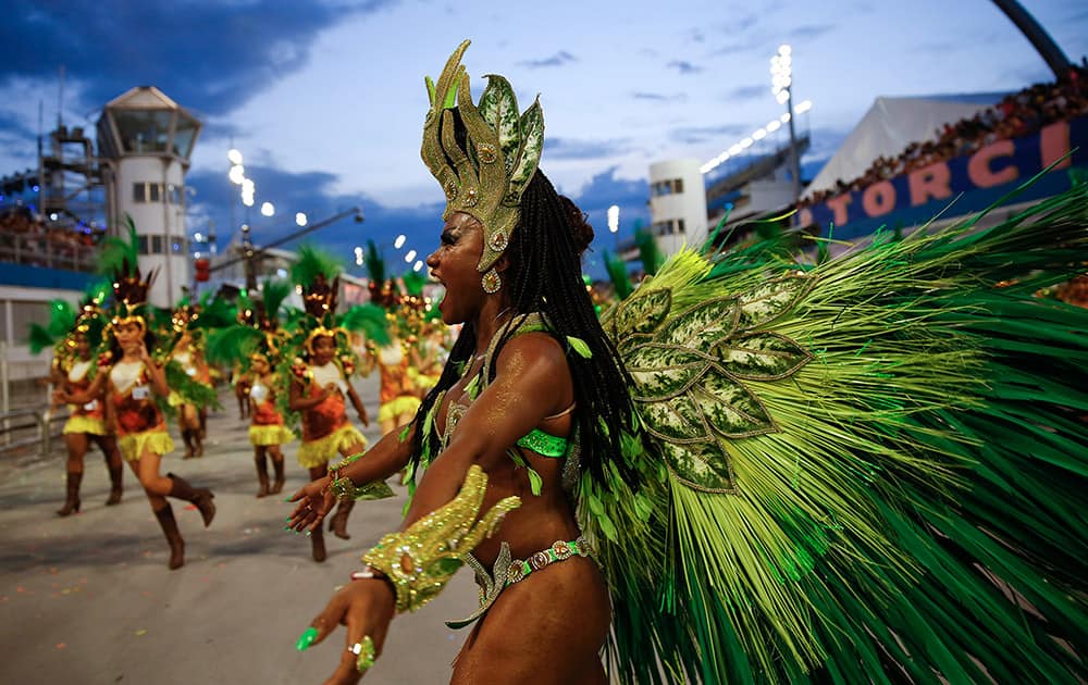 A dancer from the Nene de Vila Matilde samba school performs during a carnival parade in Sao Paulo, Brazil.