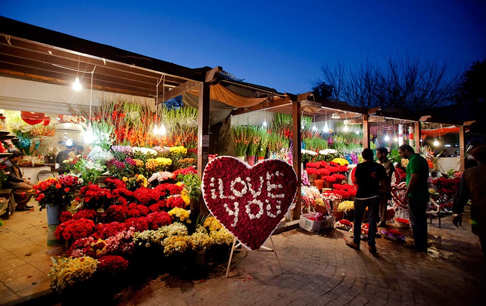 Pakistanis visit a market to buy gifts for their loved ones on Valentine's Day in Islamabad, Pakistan.