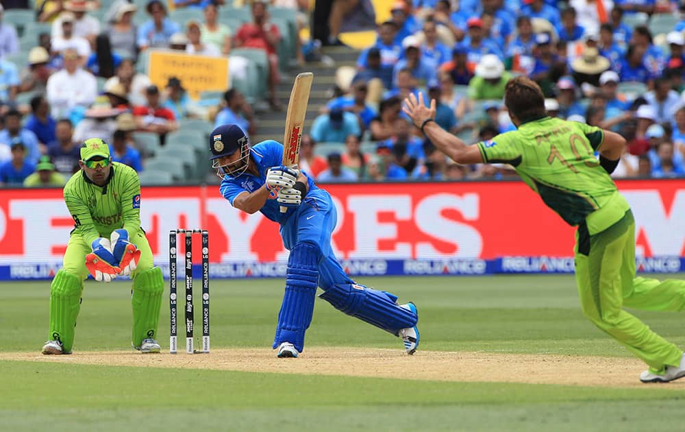 Virat Kohli plays a shot during the World Cup Pool B match against Pakistan in Adelaide, Australia.