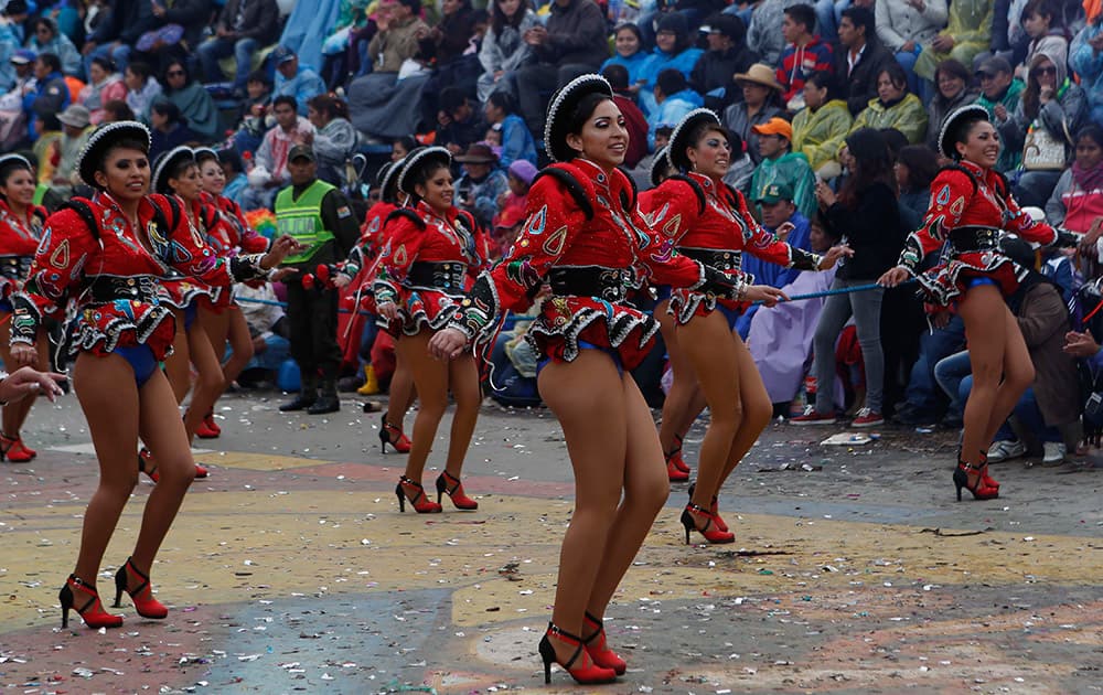 Caporal dancers perform during the carnival celebrations in Oruro, Bolivia.
