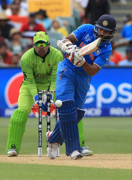 India's Shikhar Dhawan, plays a shot during the World Cup Pool B match against Pakistan in Adelaide, Australia.