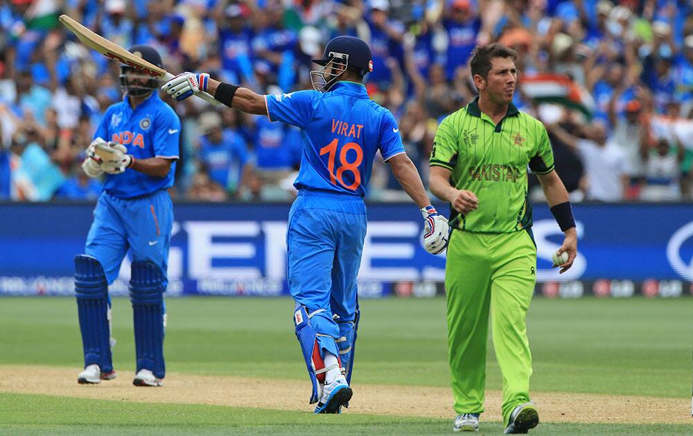 India’s Virat Kohli, who scored fifty runs acknowledges the crowd during the World Cup Pool B match in Adelaide, Australia.