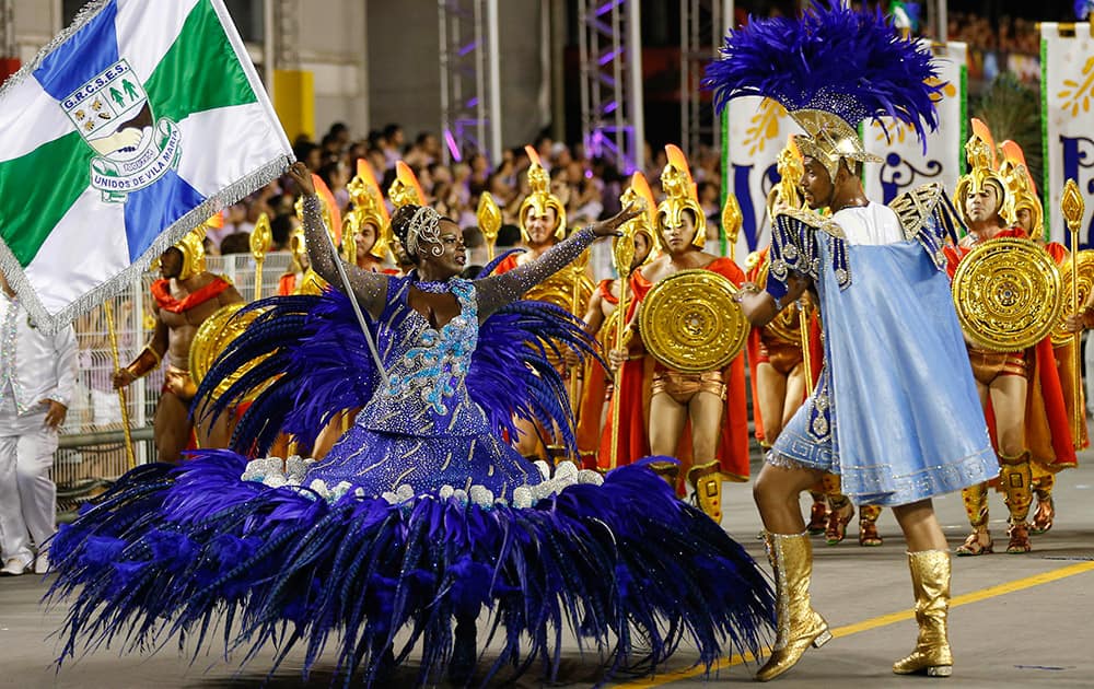 Dancers from the Vila Maria samba school perform during a carnival parade in Sao Paulo, Brazil.