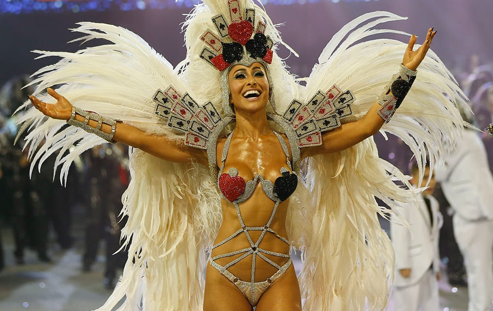 Brazilian model and comedian Sabrina Sato, from the Gavioes da Fiel samba school, performs during a carnival parade in Sao Paulo, Brazil.