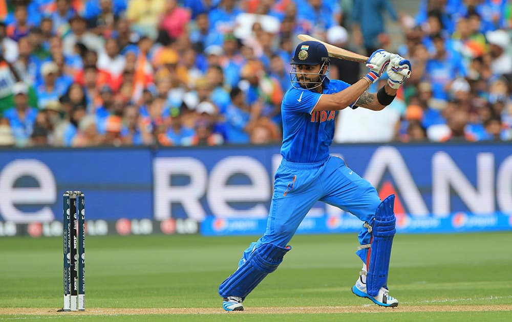 Virat Kohli, plays a shot during the World Cup Pool B match against Pakistan in Adelaide, Australia.