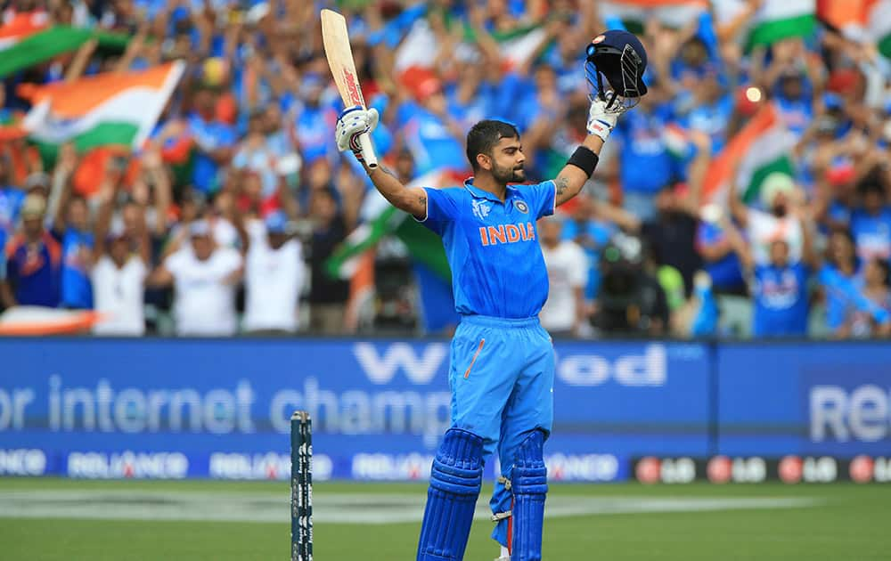 Virat Kohli, celebrates his hundred runs during the World Cup Pool B match against Pakistan in Adelaide.