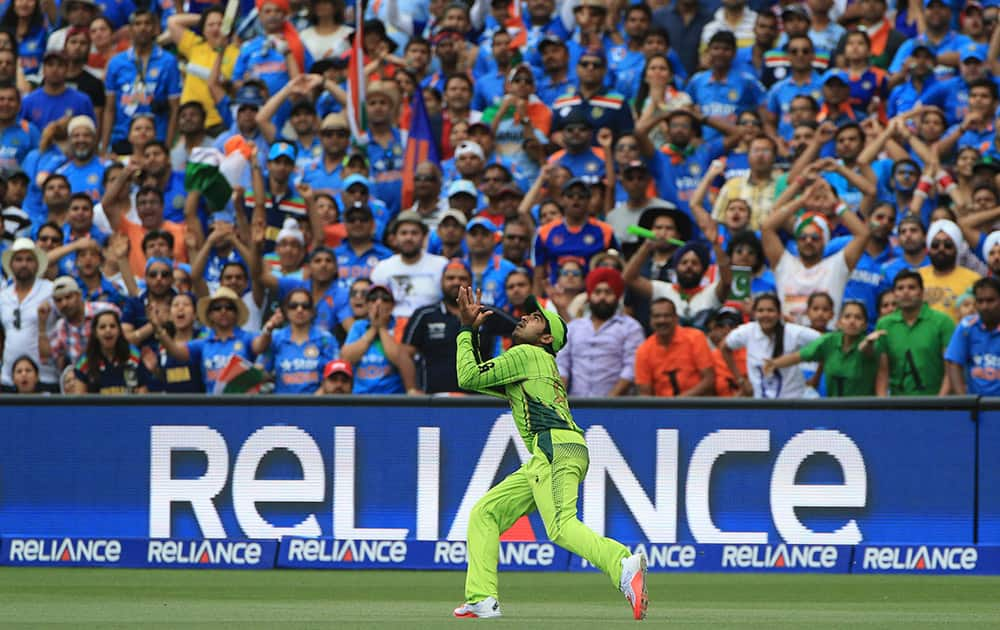 Pakistan's Haris Sohail prepares to take a catch to dismiss India's Suresh Raina during the World Cup Pool B match in Adelaide, Australia.