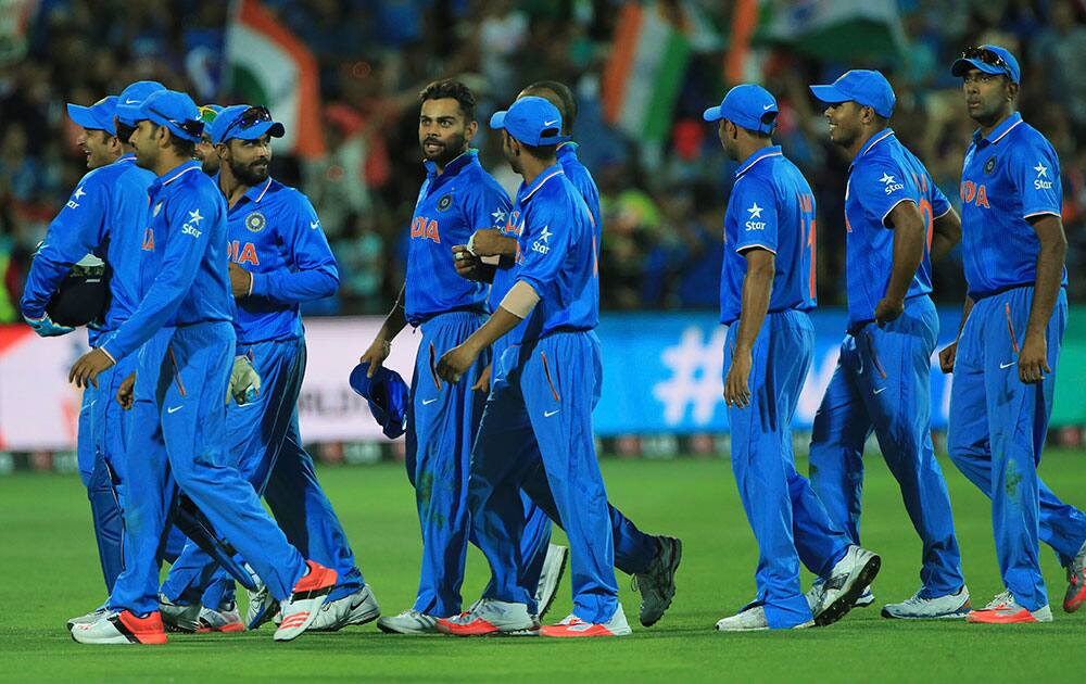 Cricket players return after they won the World Cup Pool B match against Pakistan in Adelaide.