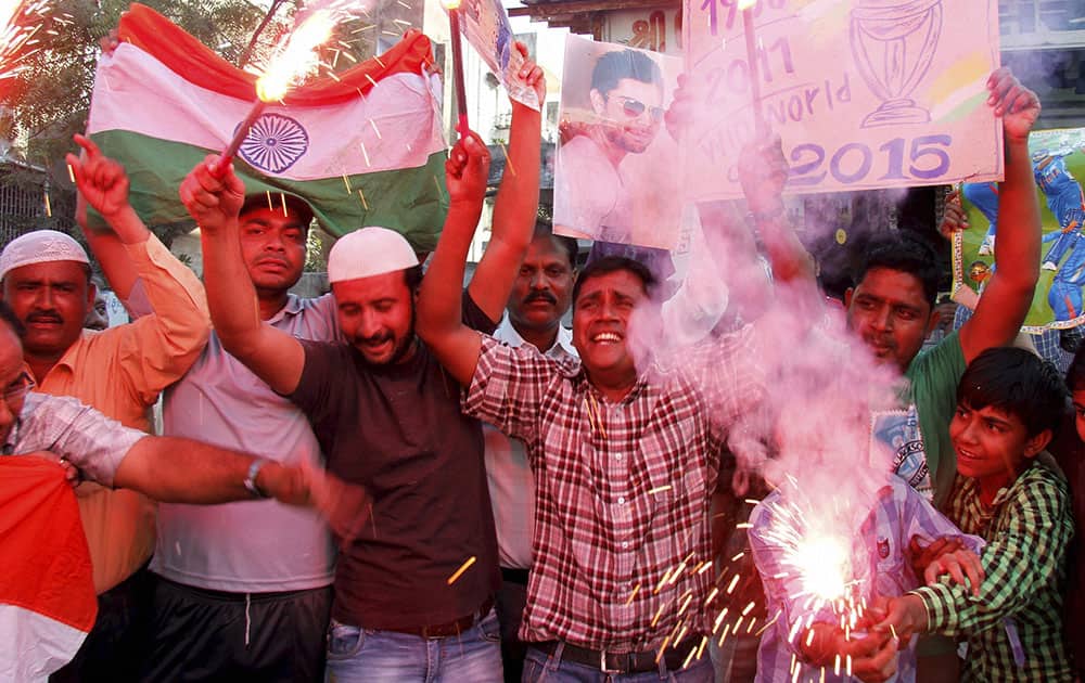 Cricket fans celebrating after team Indias victory in the ICC World Cup Pool B match against Pakistan, in Ahmedabad.