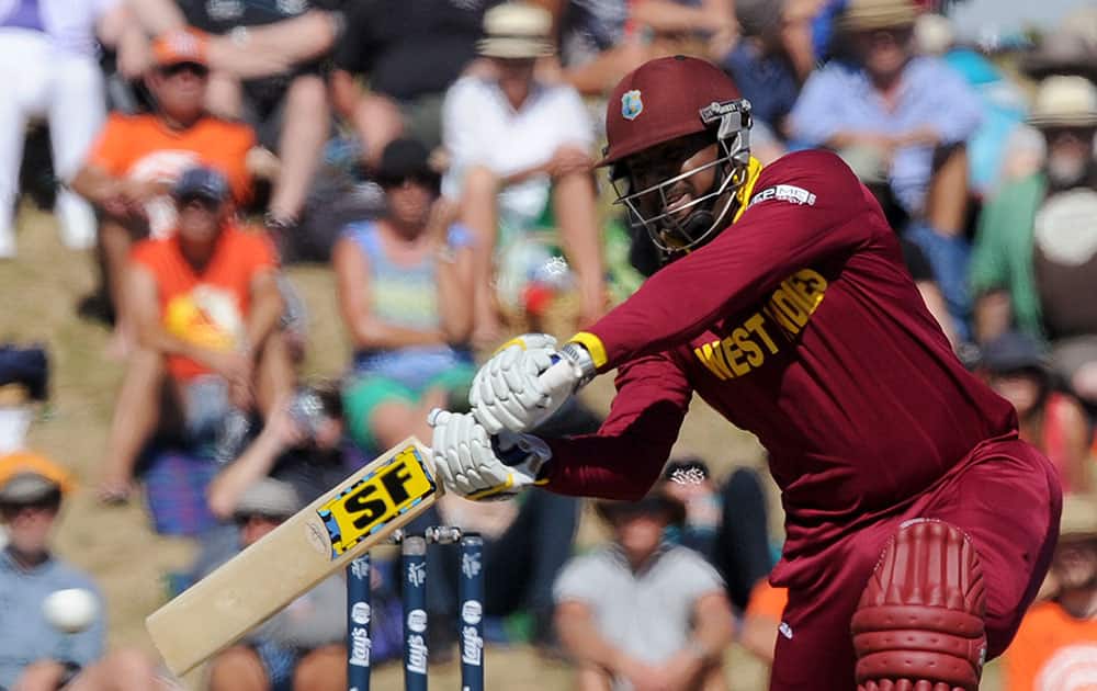 West Indies' Dwayne Smith drives the ball against Ireland during their Cricket World Cup pool B match at Nelson, New Zealand.
